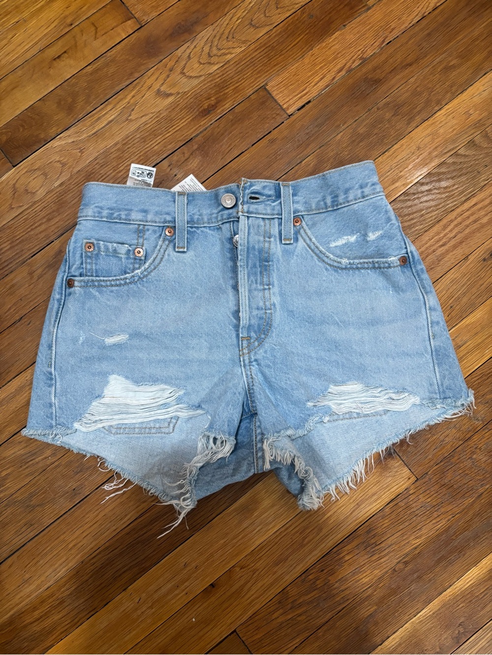 Levi’s Light Wash Distressed Denim Shorts - Women